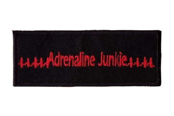 Close-up front view of a black embroidered biker patch with red stitching