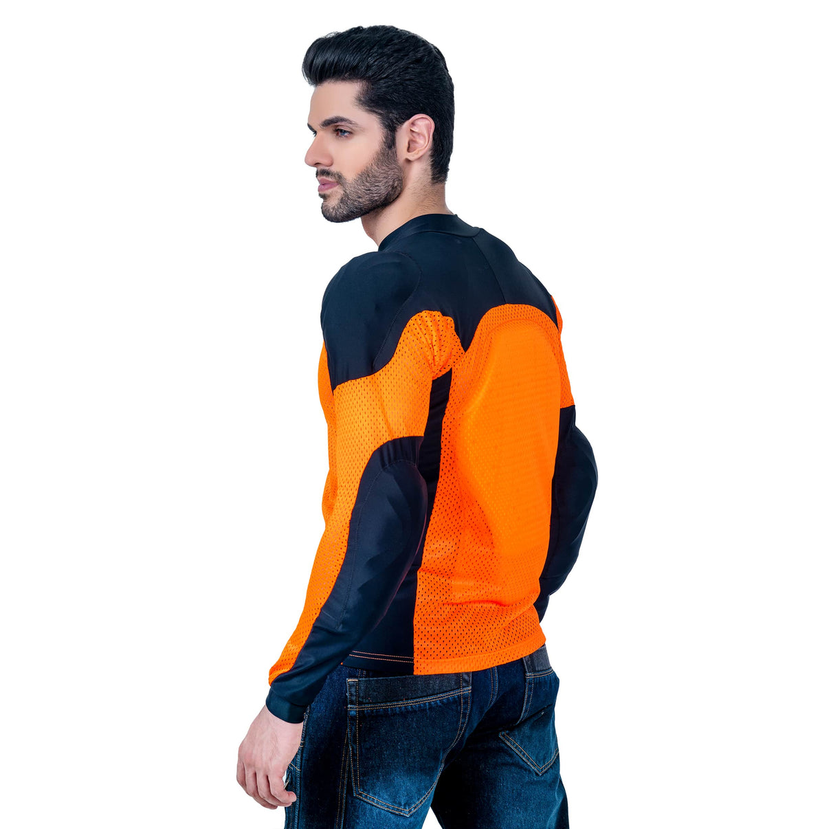 A model wears an orange and black mesh motorcycle riding shirt from a three-quarter view