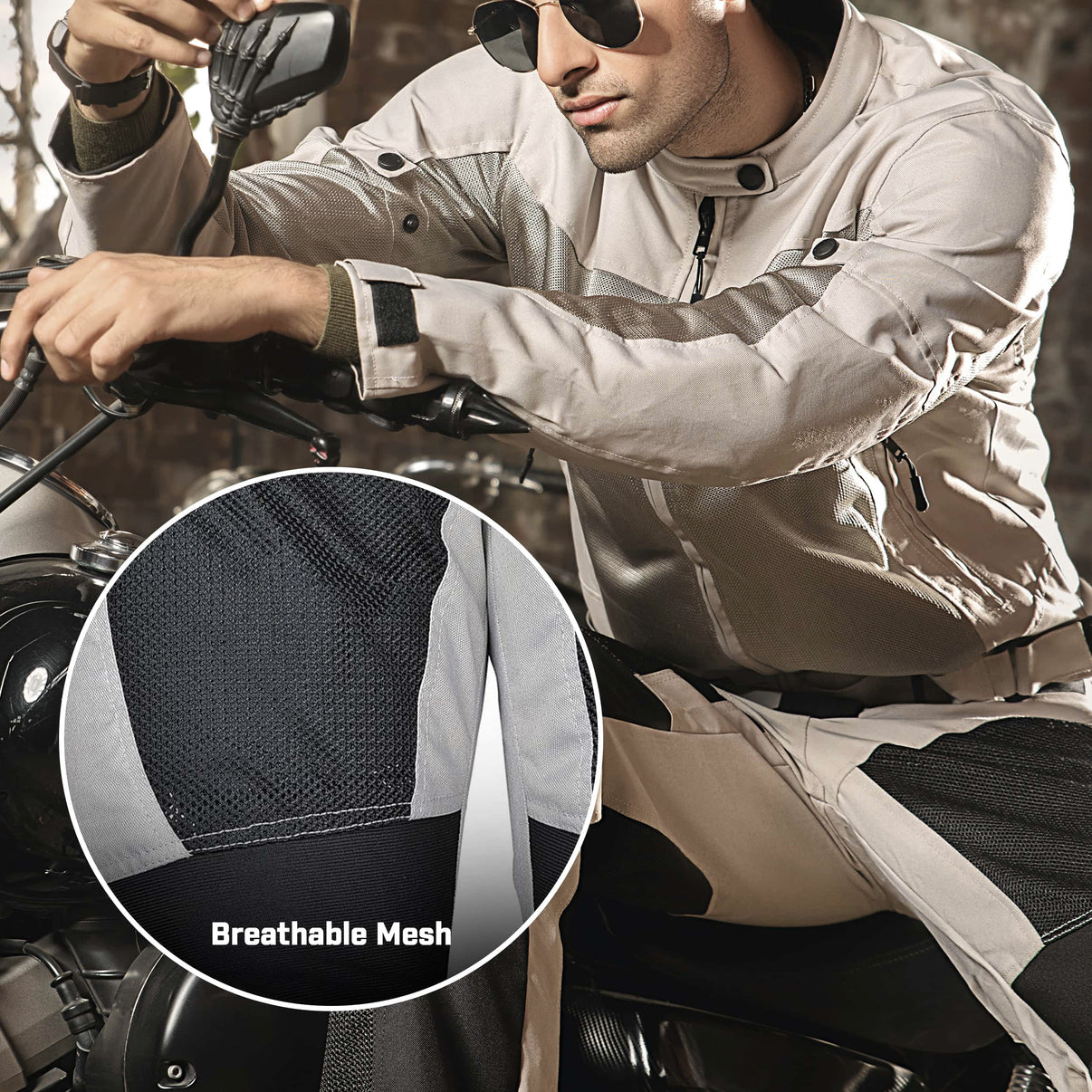 A model wears grey and black mesh motorcycle riding pants featuring mesh panels