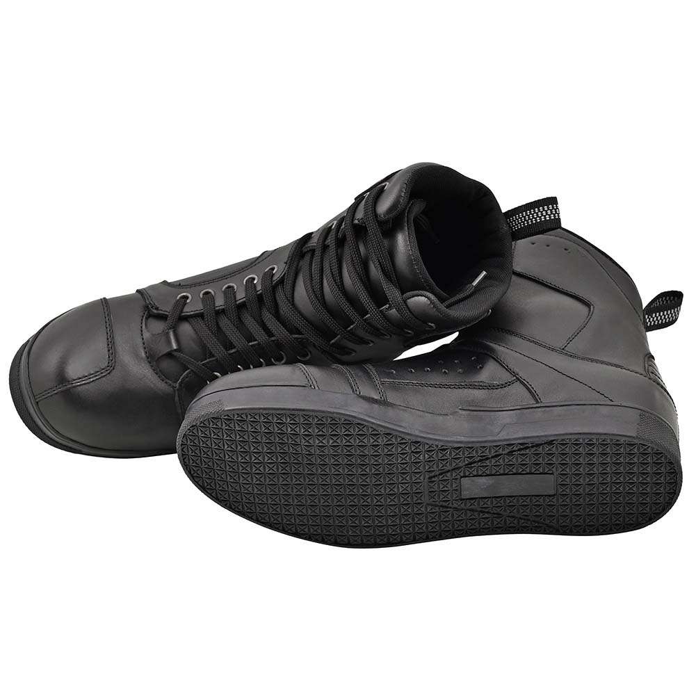 Black leather motorcycle boots shown in a three-quarter view with laces and panels