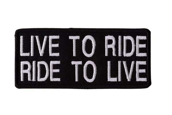 A close-up view of a black embroidered biker patch featuring white stitching