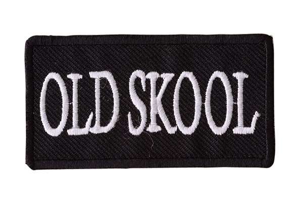A front view of a black embroidered biker patch featuring white stitching