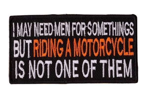 Front view of a black embroidered biker patch with white and orange stitching