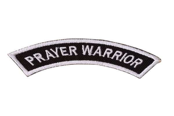 Front view of a black embroidered biker patch with white stitching and text
