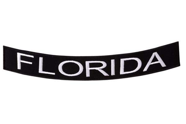 A curved black embroidered biker patch featuring white lettering