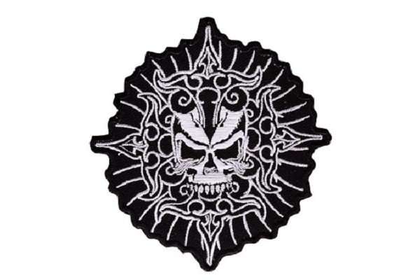 Front view of a black and white embroidered biker patch featuring white stitching and a skull