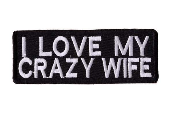 Close-up of a black embroidered biker patch featuring white stitching