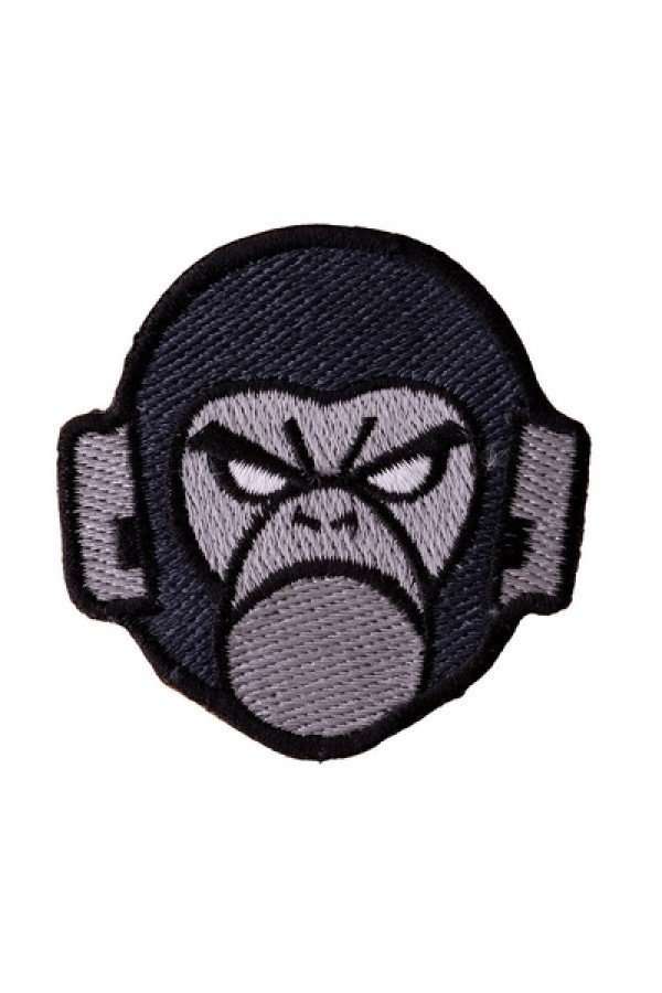 Front view of a black and grey embroidered biker patch depicting an angry ape face with topstitching