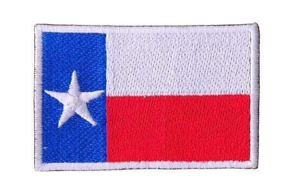 A close-up of a rectangular embroidered biker patch featuring the Texas state flag design