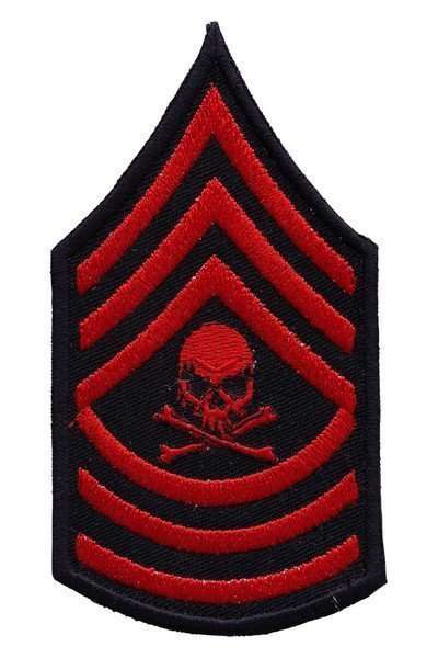 Front view of a red and black embroidered biker patch featuring stitched chevron and skull details