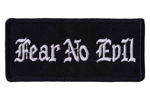 Close-up of a black embroidered biker patch featuring white stitching