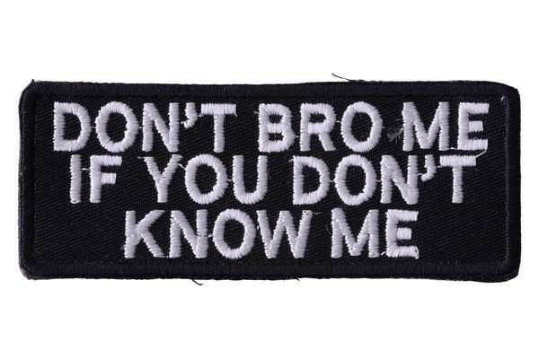 Close-up front view of a black embroidered biker patch featuring white stitching