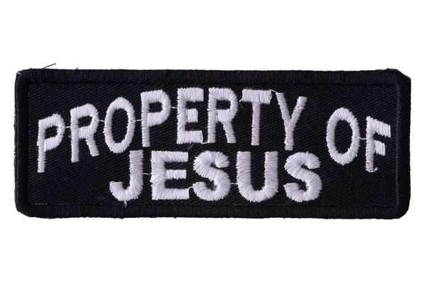 This close-up shows a black embroidered biker patch with white stitching
