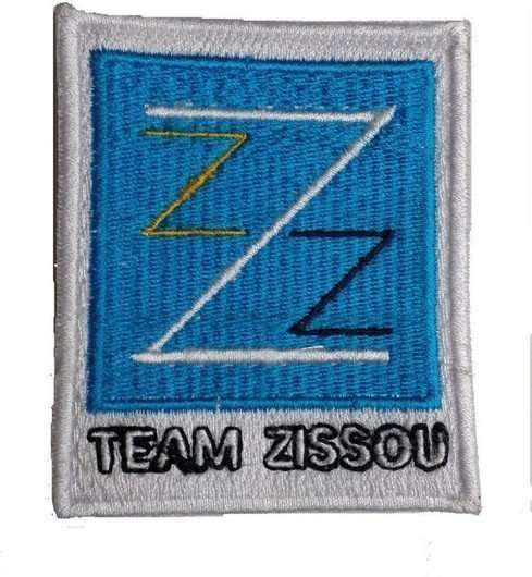 Close-up front view of an embroidered biker patch with white stitching and panels
